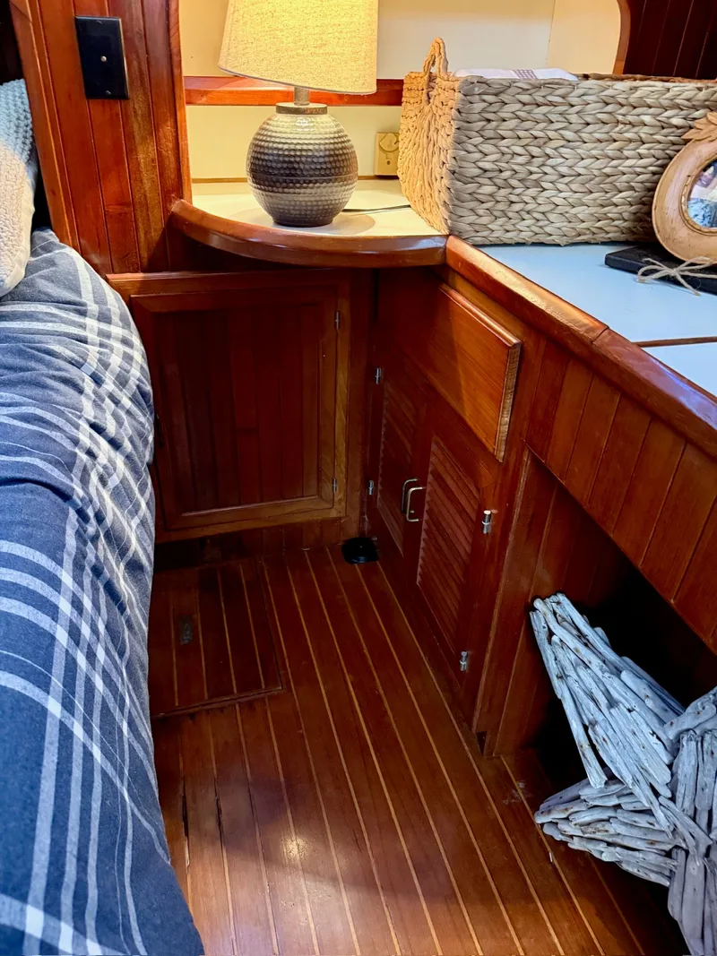Slide: The Image of Interior of a 1988 PT 42 Yacht with wooden furnishings. - 20