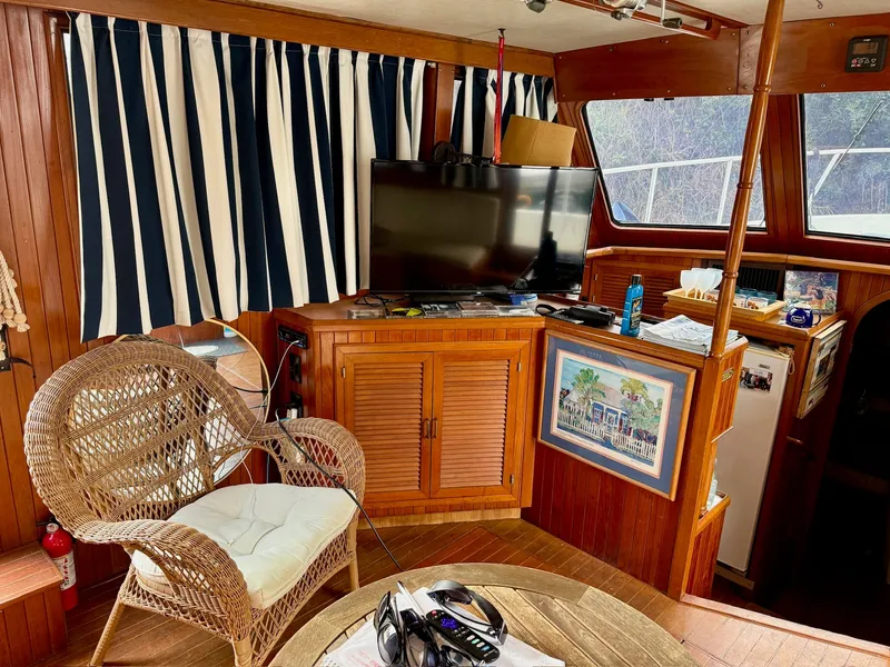 Slide: The Image of Interior of a 1988 PT 42 Yacht with wooden furnishings. - 26