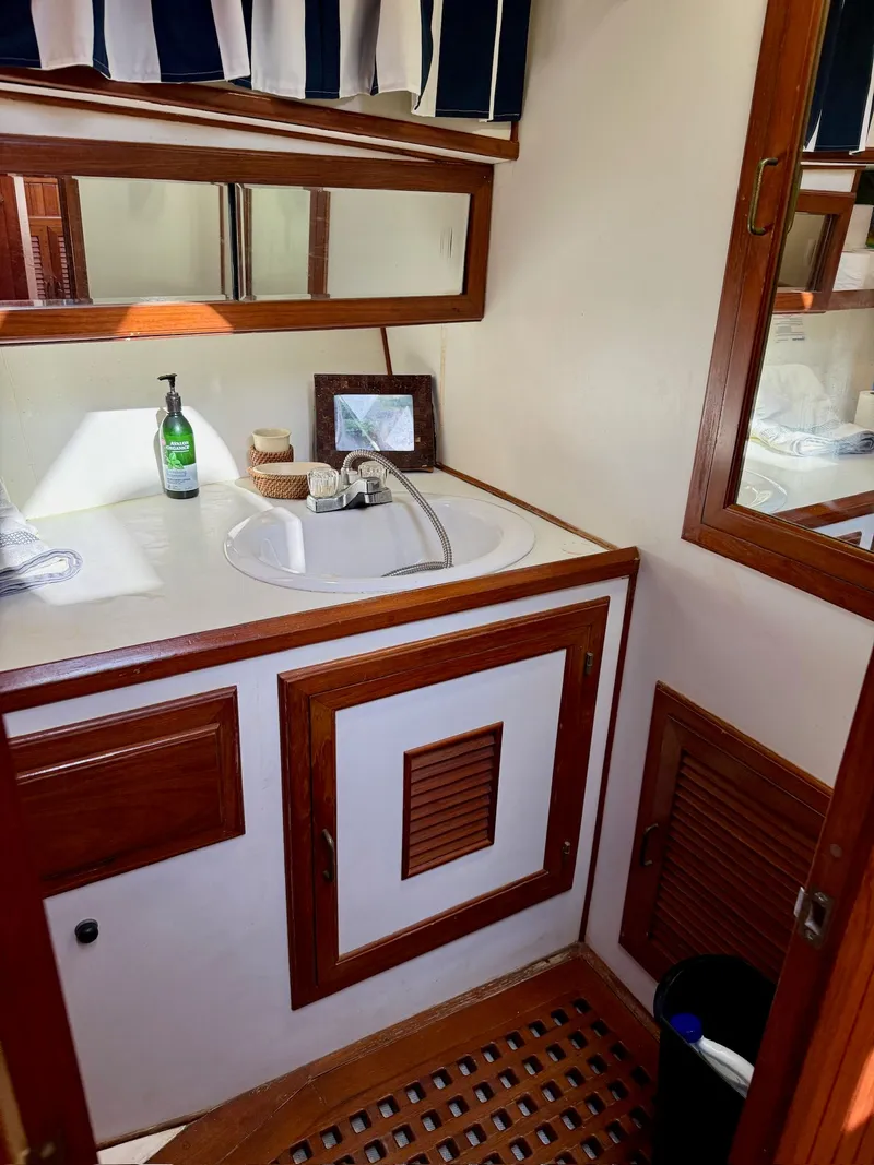 Slide: The Image of Bathroom in 1988 PT 42 Yacht with wood paneling. - 32