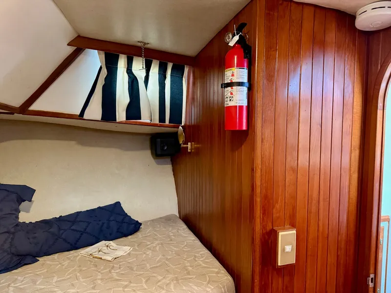Slide: The Image of Interior of a 1988 PT 42 Yacht with wooden walls. - 38