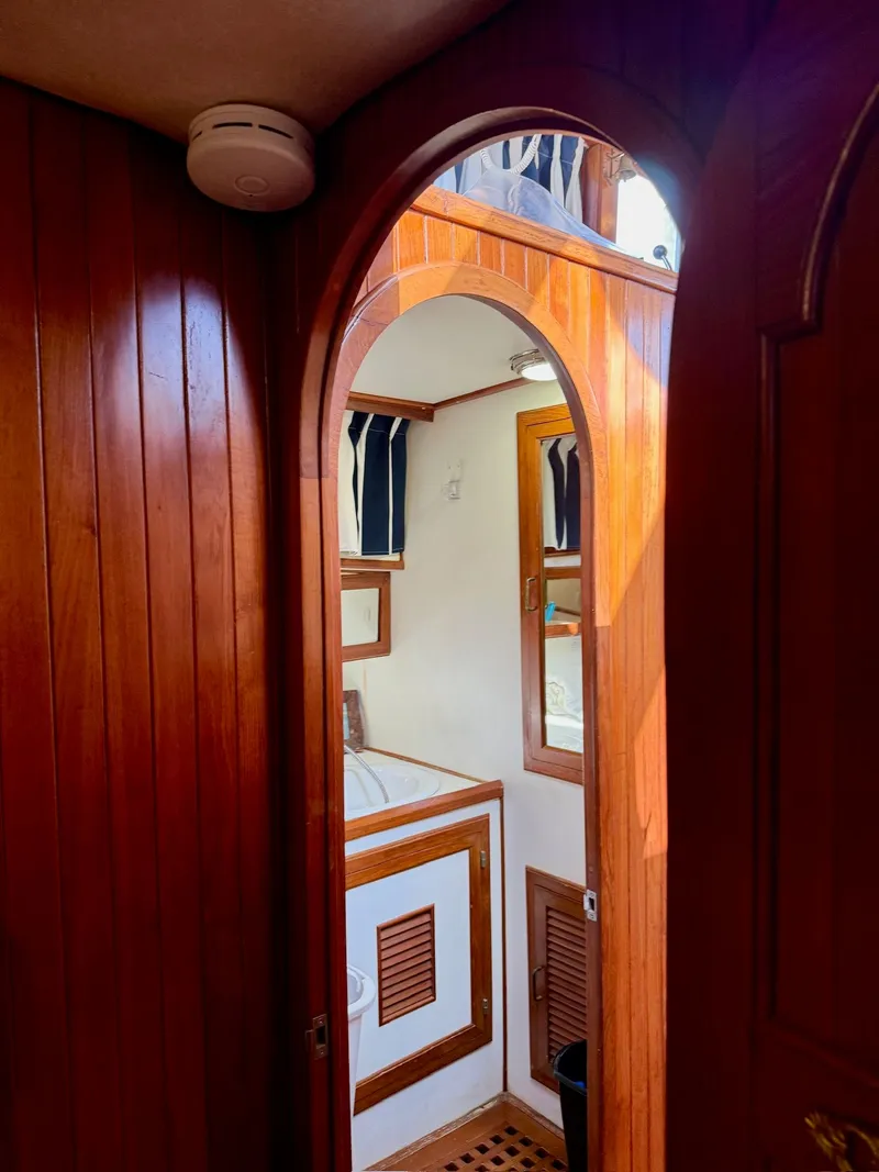 Slide: The Image of Interior of a 1988 PT 42 Yacht with wooden doors. - 39