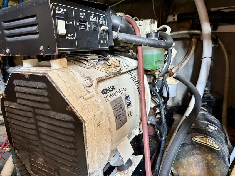 Slide: The Image of Kohler generator in the engine room of a 1988 PT 42 Yacht. - 42