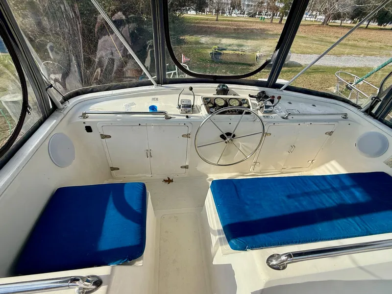 Slide: The Image of Interior of a 1988 PT 42 Yacht with helm station. - 6