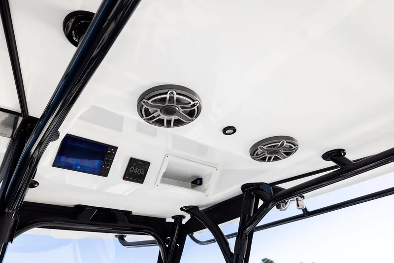 Slide: The Image of 2023 Yellowfin 32 Offshore boat interior with speakers and electronic displays. - 41