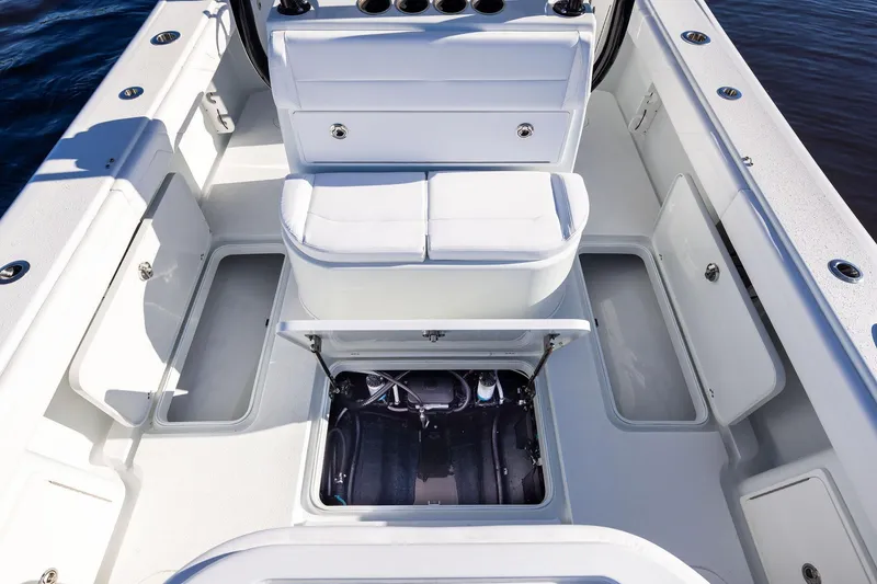 Slide: The Image of 2023 Yellowfin 32 Offshore boat interior with open storage compartments. - 64