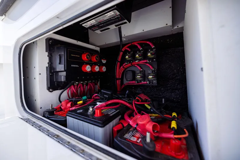 Slide: The Image of Electrical system of 2023 Yellowfin 32 Offshore boat, featuring batteries and wiring. - 69