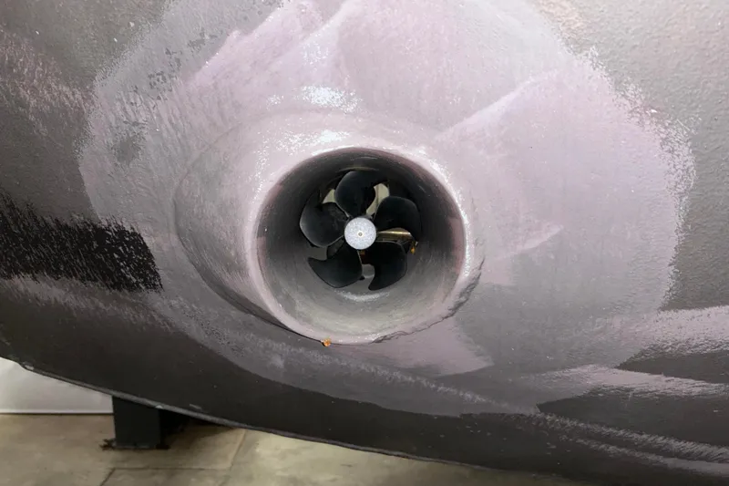 Slide: The Image of Close-up of a 1963 Motor Life Boat 44 propeller in a painted hull. - 23