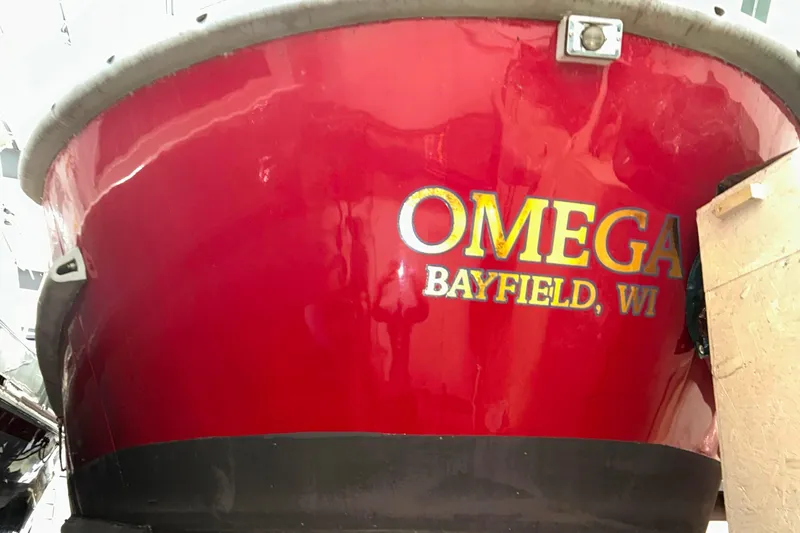 Slide: The Image of Red Motor Life Boat 44, 1963, with "OMEGA" and "BAYFIELD, WI" text on the hull. - 3