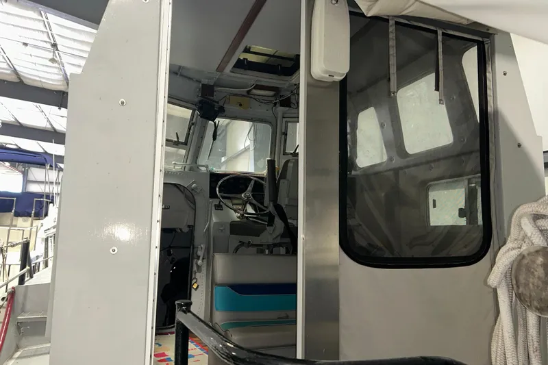 Slide: The Image of Interior view of a 1963 Motor Life Boat 44, showcasing the cockpit and controls. - 9