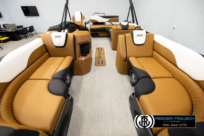 Slide: The Image of Luxurious 2026 Avalon LSZ CRB boat interior with tan and black seating, featuring modern design. - 13
