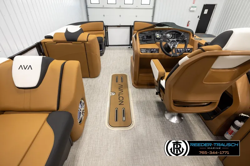 Slide: The Image of Luxurious interior of 2026 Avalon LSZ CRB boat with tan seating and modern dashboard. - 17