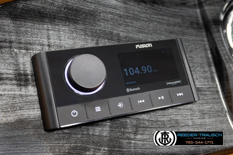 Slide: The Image of 2026 Avalon LSZ CRB dashboard with Fusion marine stereo, Bluetooth, and SiriusXM compatibility. - 33