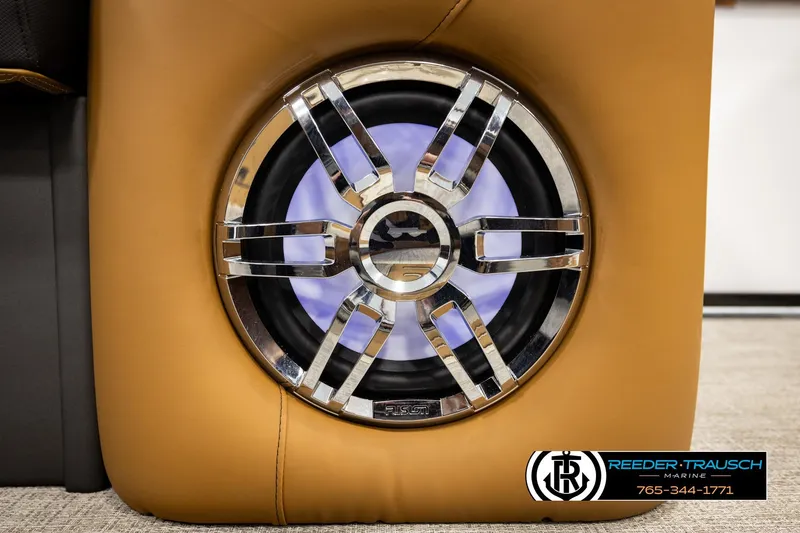 Slide: The Image of Speaker with chrome grille on 2026 Avalon LSZ CRB boat, Reeder-Trausch Marine logo visible. - 46