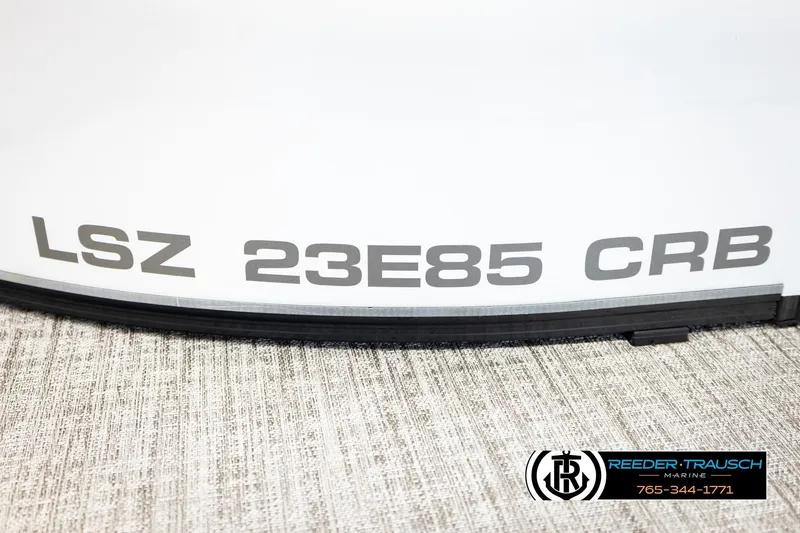 Slide: The Image of 2026 Avalon LSZ CRB boat model detail with Reeder-Trausch Marine logo. - 49