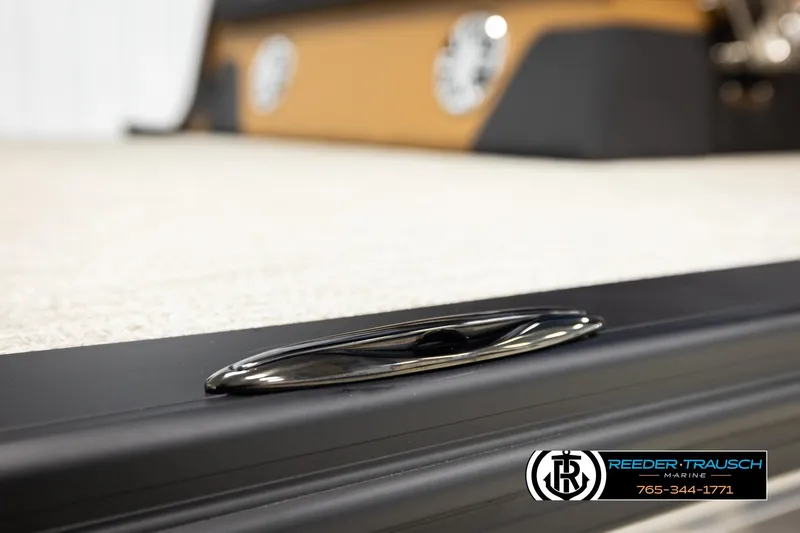 Slide: The Image of 2026 Avalon LSZ CRB boat detail with Reeder-Trausch Marine branding. - 52