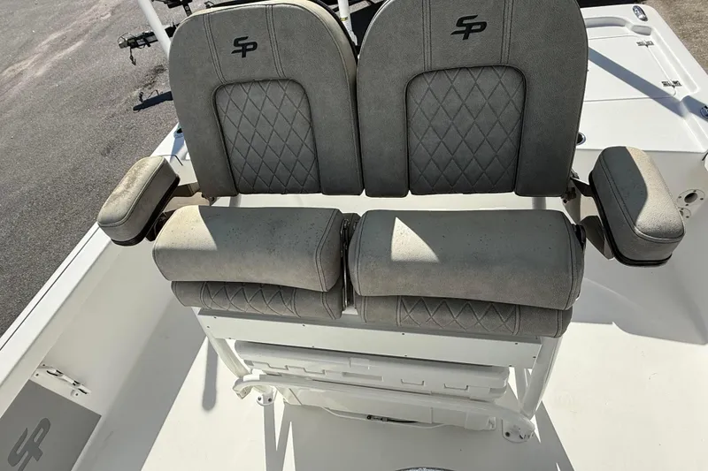 Slide: The Image of 2022 Sea Pro 248 Bay boat seats with armrests and diamond stitching. - 7