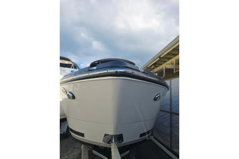 The Image of 2021 Monterey 255SS Super Sport boat, front view under cloudy sky. - 1
