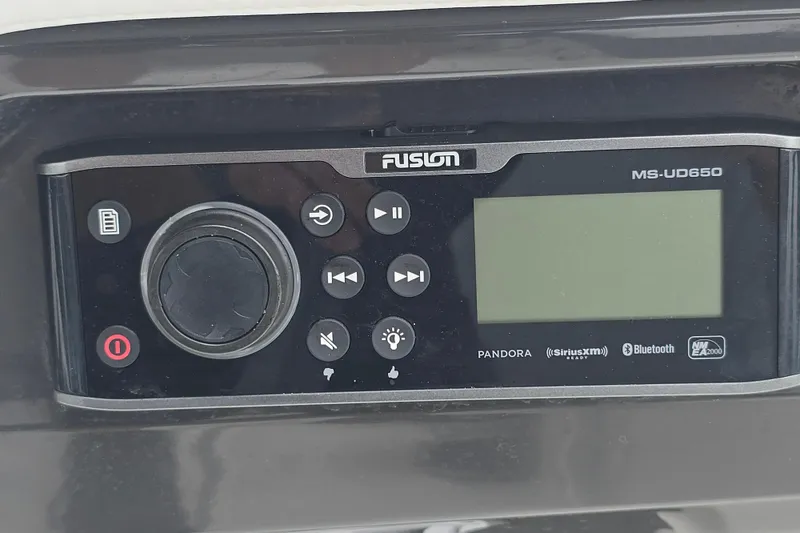 Slide: The Image of Fusion MS-UD650 stereo system on 2021 Monterey 255SS Super Sport boat dashboard. - 7