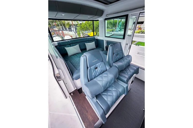 Slide: The Image of Luxurious interior of 2023 Axopar 37 XC Cross Cabin with plush seating and modern design. - 39