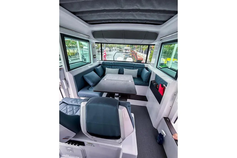 Slide: The Image of Luxurious interior of 2023 Axopar 37 XC Cross Cabin with plush seating and modern design. - 41