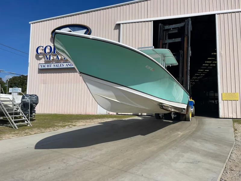 Slide: The Image of 2007 SeaCraft 32 boat exiting a boatyard building. - 3