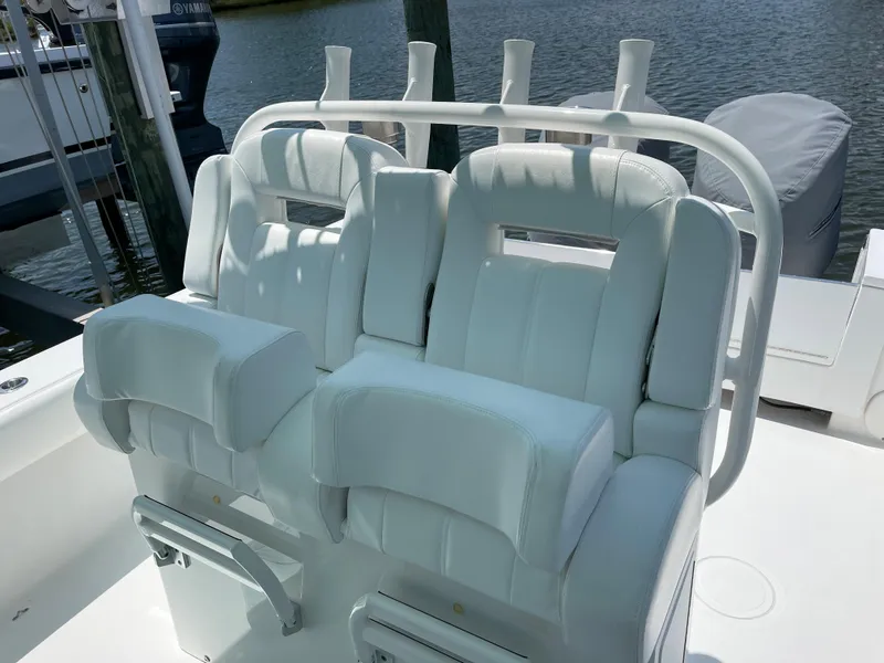 Slide: The Image of White cushioned seats on a 2007 SeaCraft boat. - 38