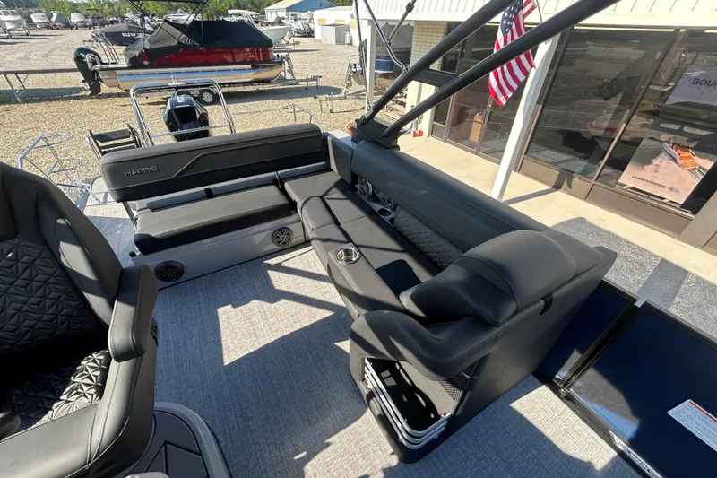 Slide: The Image of 2026 Harris Grand Mariner 250 pontoon boat interior with luxurious seating and modern design. - 27