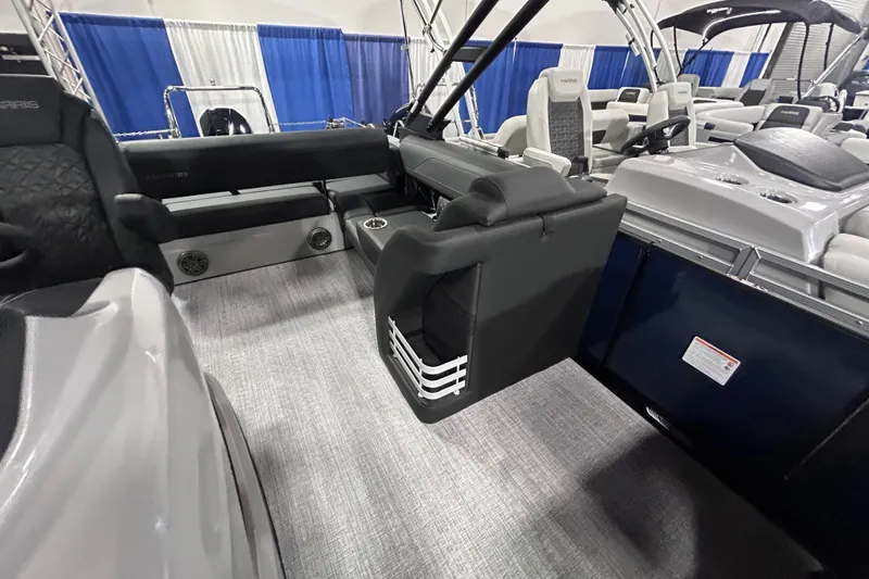 Slide: The Image of 2026 Harris Grand Mariner 250 interior with modern seating and sleek design. - 6