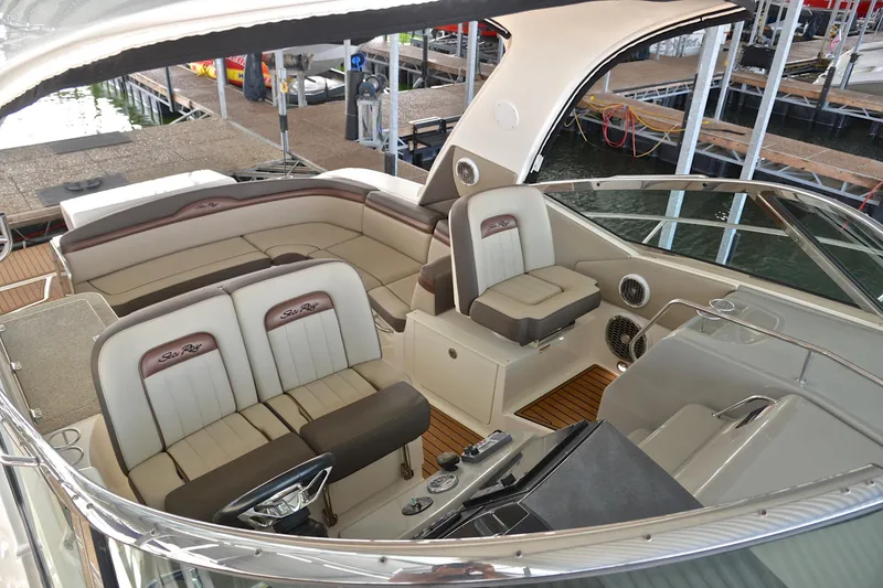 Slide: The Image of 2016 Sea Ray Sundancer 370 interior with luxurious seating and modern design. - 10