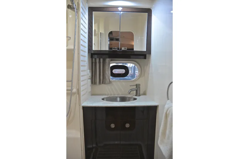 Slide: The Image of Luxurious bathroom interior of 2016 Sea Ray Sundancer 370 yacht with modern fixtures. - 41