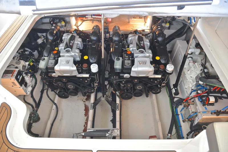 Slide: The Image of Engine compartment of 2016 Sea Ray Sundancer 370 with dual V8 engines. - 45