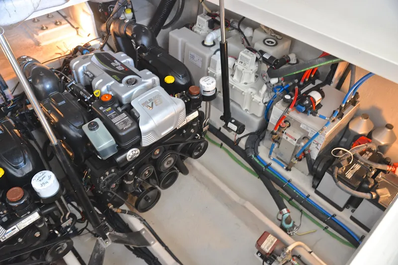 Slide: The Image of Engine room of 2016 Sea Ray Sundancer 370 with visible components and wiring. - 47