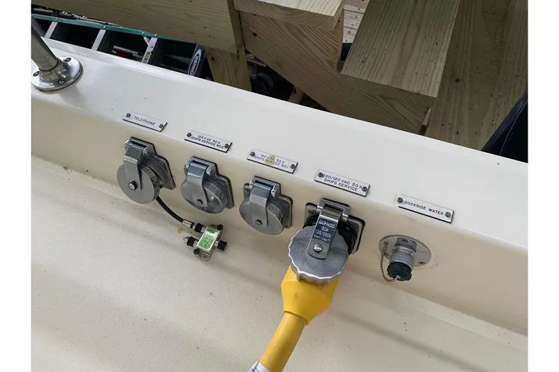 Slide: The Image of Electrical and water connections on a 1978 Hatteras 53 Motor Yacht. - 19