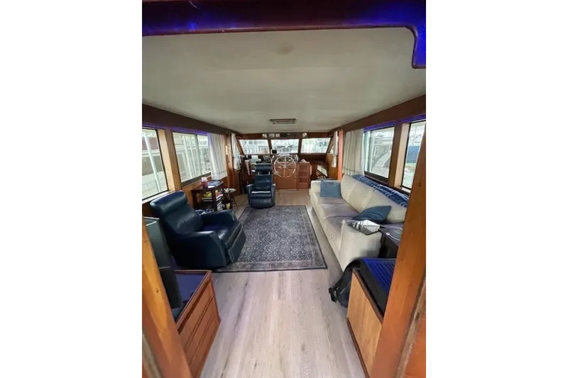 Slide: The Image of Interior of 1978 Hatteras 53 Motor Yacht with seating and helm station. - 33