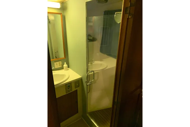 Slide: The Image of Bathroom interior of 1978 Hatteras 53 Motor Yacht with shower and sink. - 50