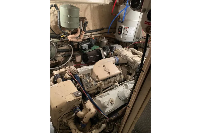 Slide: The Image of Interior hallway of a 1978 Hatteras 53 Motor Yacht with patterned carpet. - 68