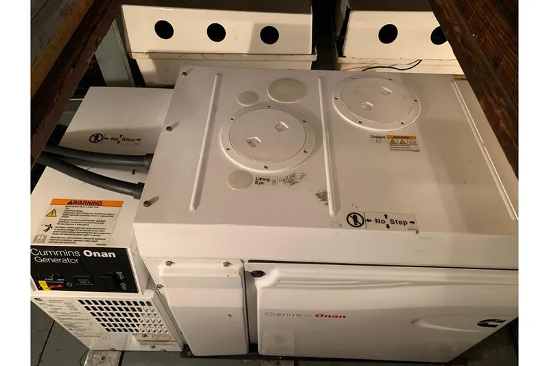 Slide: The Image of Engine room access on 1978 Hatteras 53 Motor Yacht with fire extinguisher. - 74