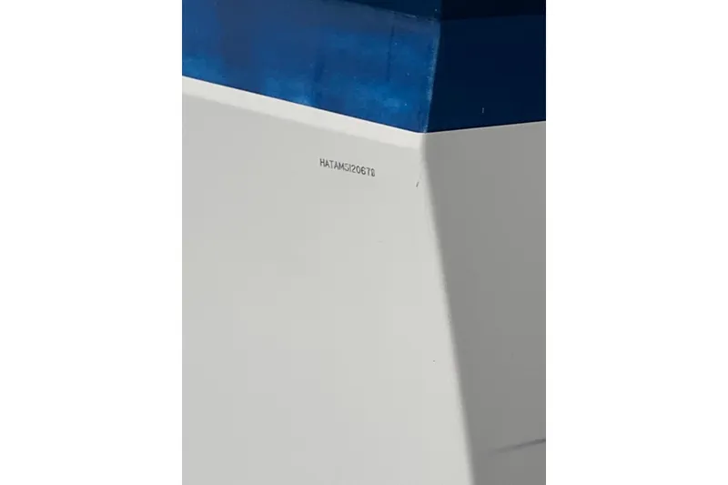 Slide: The Image of Cummins Onan generator in a 1978 Hatteras 53 Motor Yacht engine room. - 76