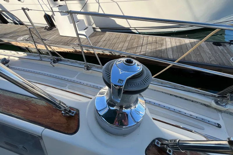 Slide: The Image of Winch on 1985 Caliber 47LRC sailboat deck, docked at marina. - 4