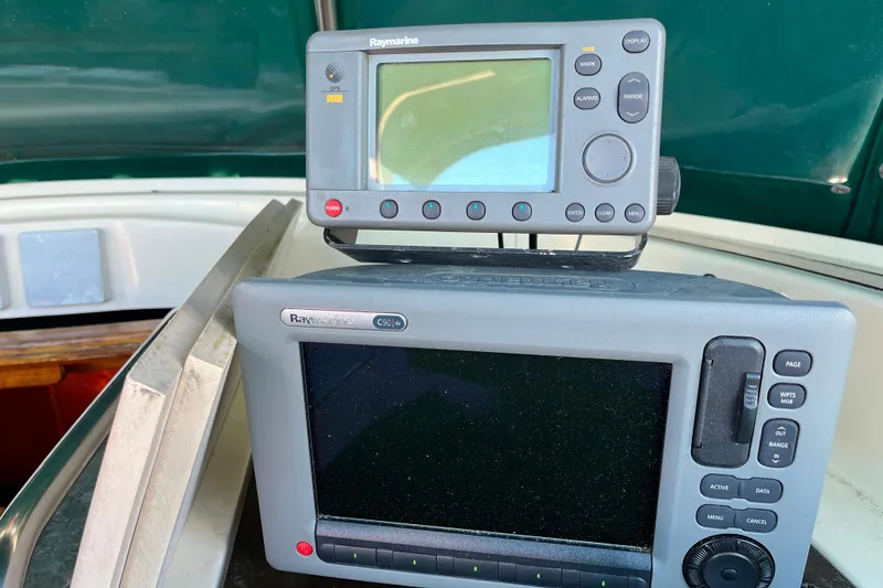 Slide: The Image of Raymarine navigation equipment on 1985 Caliber 47LRC sailboat cockpit. - 5