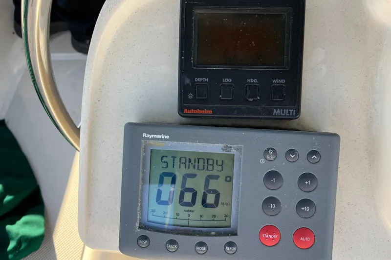 Slide: The Image of Autopilot and navigation instruments on a 1985 Caliber 47LRC sailboat. - 7