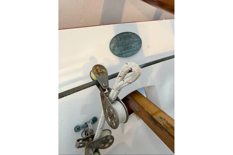 Slide: The Image of Herreshoff 12 1/2 sailboat hardware and plaque, 2002 model, detailed view. - 12