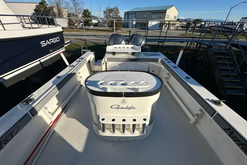 Slide: The Image of 2019 Parker 2820 XLD Sport Cabin boat deck with fishing equipment. - 13