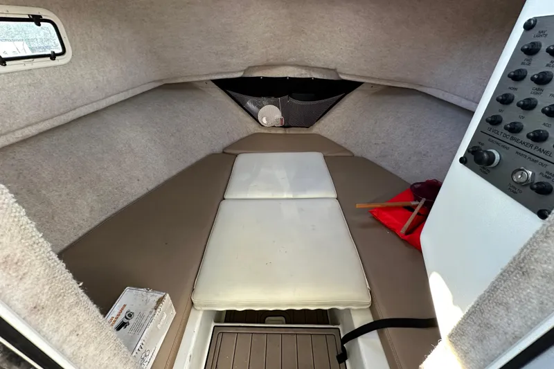 Slide: The Image of 2019 Parker 2820 XLD Sport Cabin interior with cushioned seating and control panel. - 29