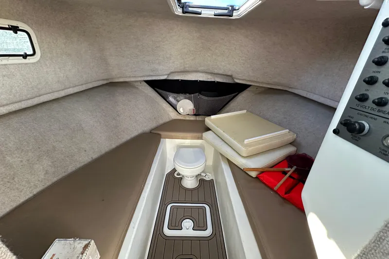Slide: The Image of 2019 Parker 2820 XLD Sport Cabin interior with toilet and control panel. - 30