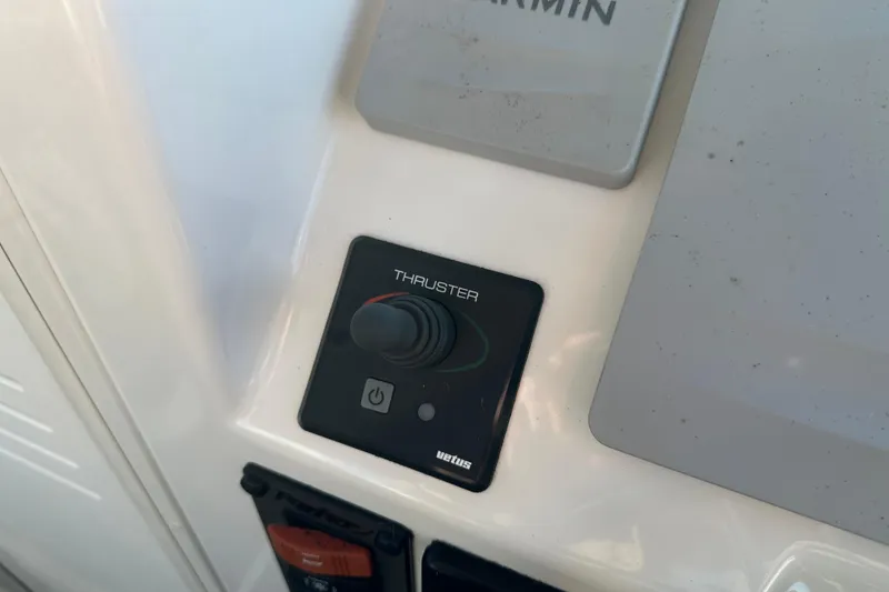 Slide: The Image of Control panel of a 2019 Parker 2820 XLD Sport Cabin boat with thruster joystick. - 31
