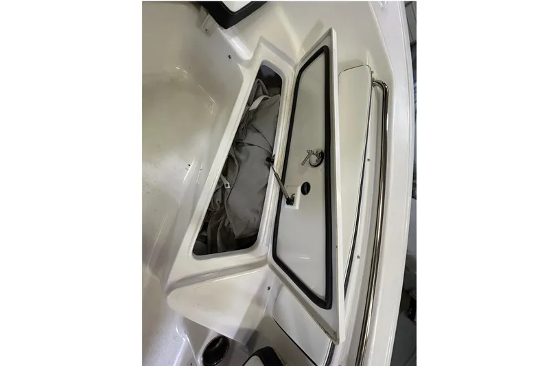 Slide: The Image of Open storage compartment on 2024 Tidewater 198 CC Adventure boat. - 7