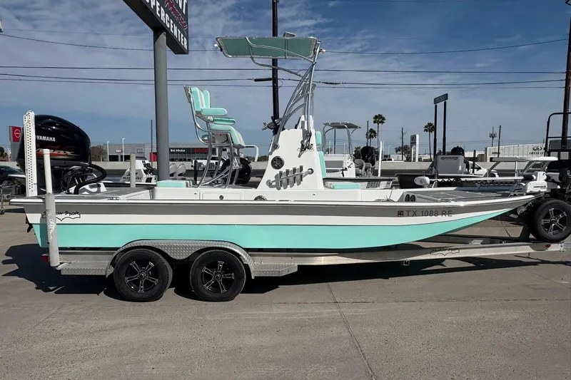 The Image of 2020 Shallow Sport 24 Sport boat on trailer, parked outdoors. - 0