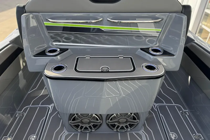 Slide: The Image of 2026 Sunsation 32 CCX boat interior with sleek design, cup holders, and modern features. - 14