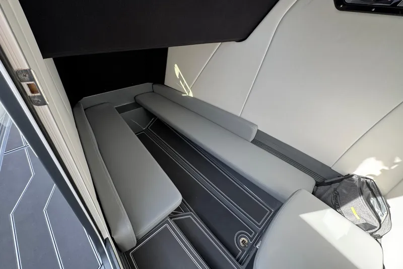Slide: The Image of 2026 Sunsation 32 CCX cabin interior with sleek gray seating and modern design. - 17